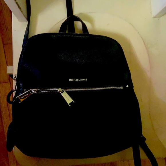 Black Michael Kors purse/ mini backpack